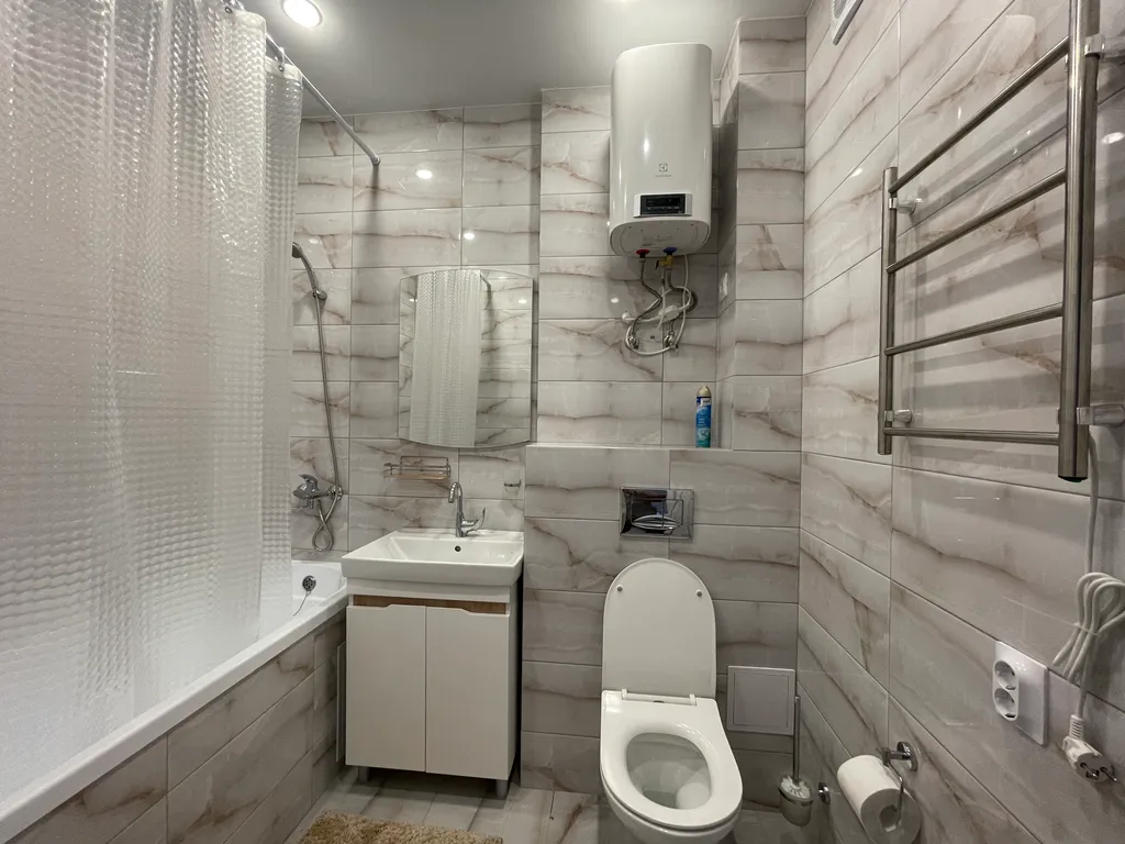 Новая квартира у ЖД вокзала в центре с теплой парковкой