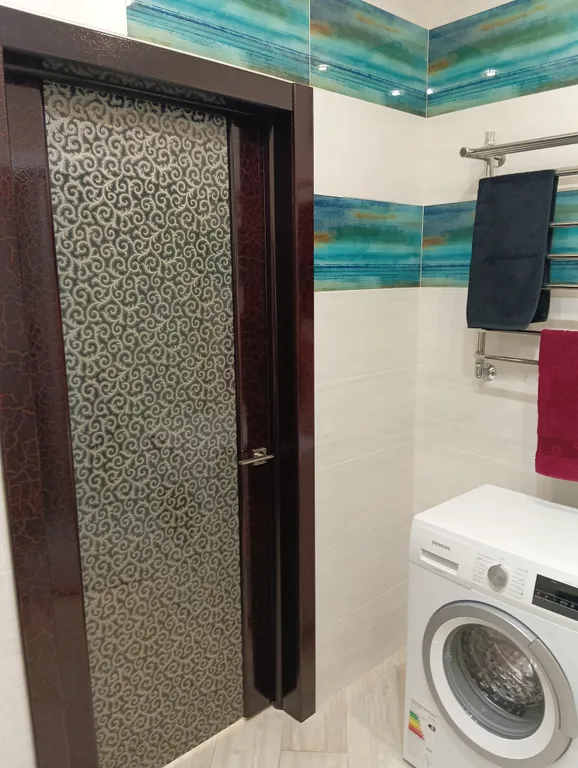 Видовая квартира с дизайнерским ремонтом у Дворца игровых видов спорта