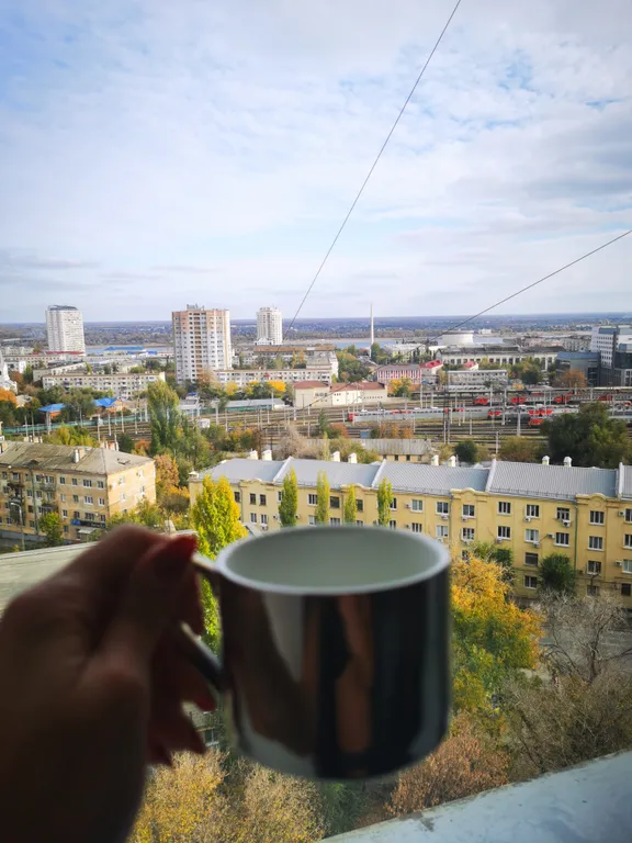 Уютная, тёплая, светлая квартира с видом на город и Волгу