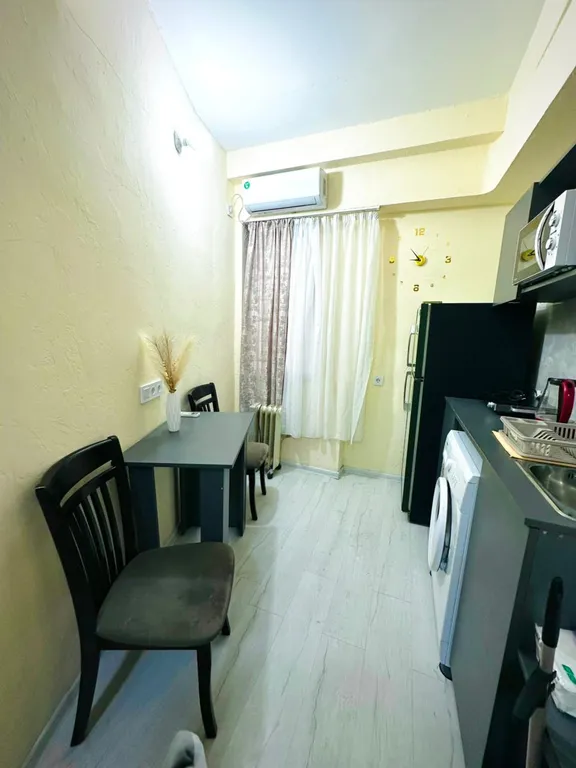 В центре рядом с музеем Сергея Параджанова