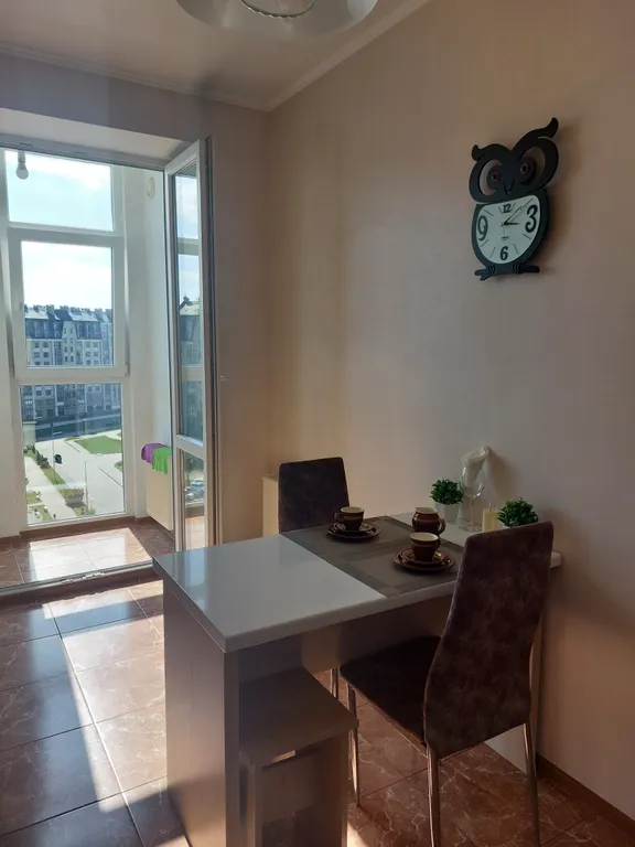 Уютная квартира с панорамными окнами в пол и красивым видом на парк