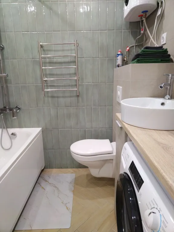 Уютная студия в новом доме с современным ремонтом