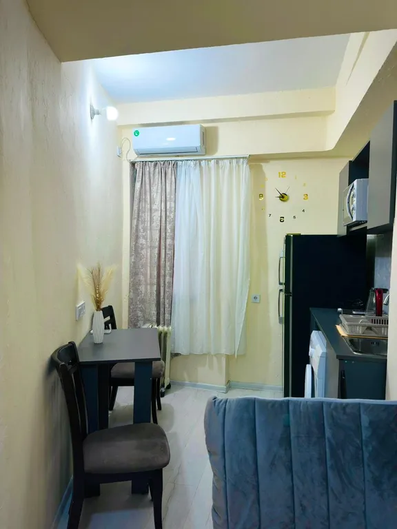 В центре рядом с музеем Сергея Параджанова