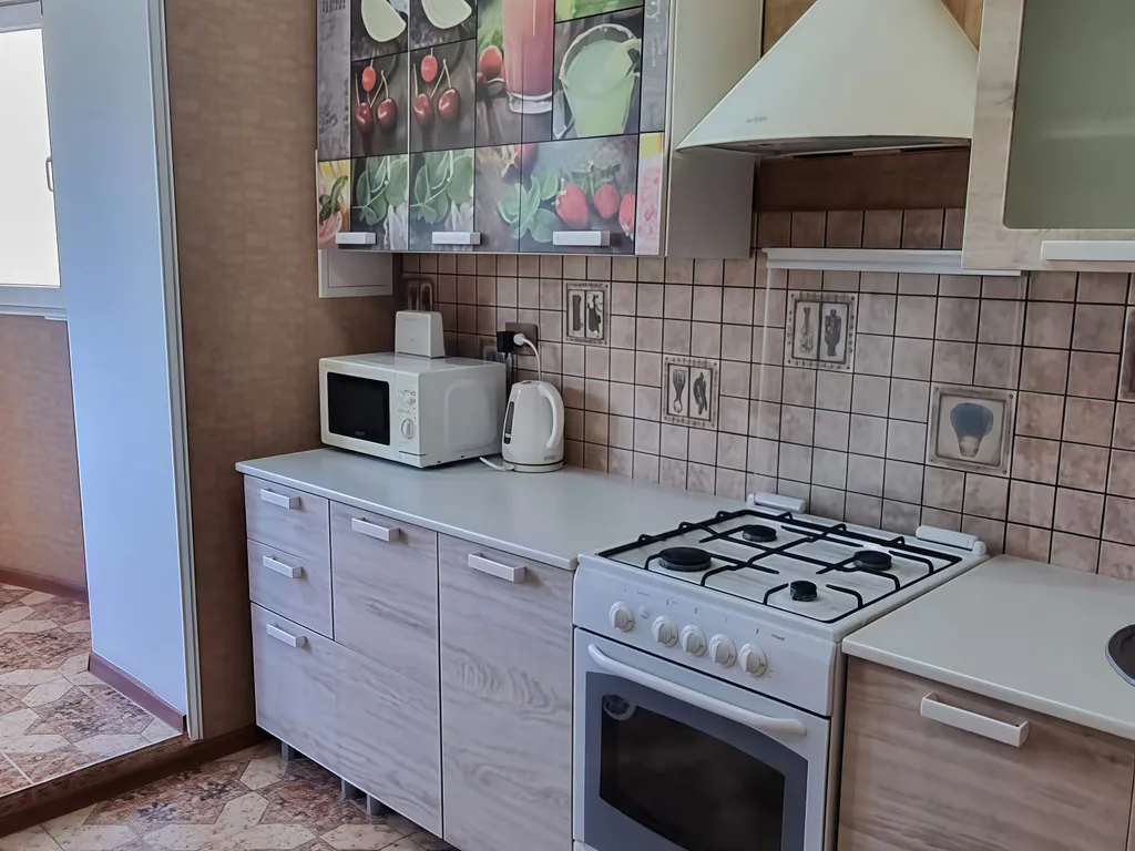 Уютная квартира на Победы с расширенной кухонной зоной (Уютный Дом)