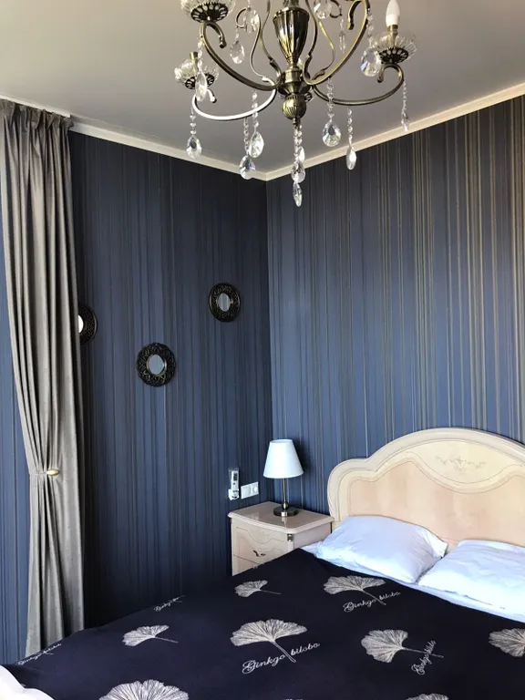 Просторная квартира-люкс в стиле английской классики с панорамным видом