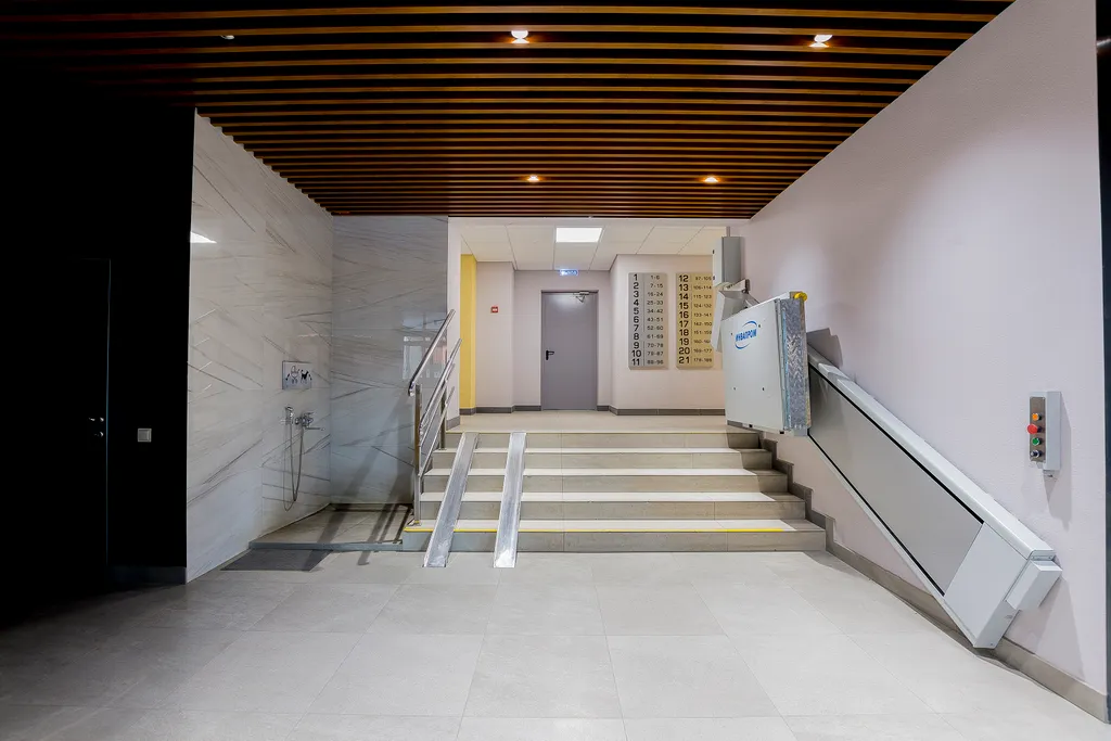 Уютная квартира в ЖК Паруса с подвесным креслом от Kravc Group