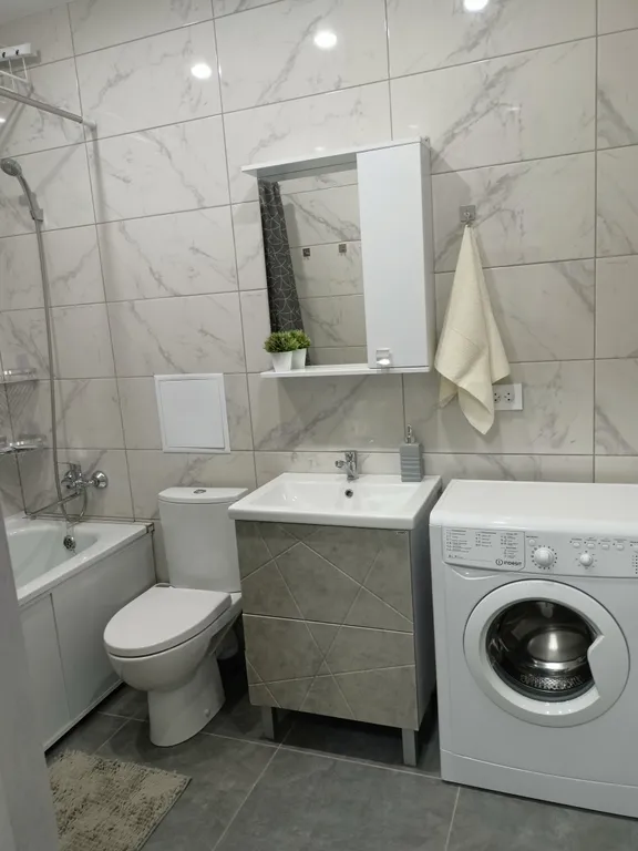 Уютная квартира в Дзержинском районе в новом доме