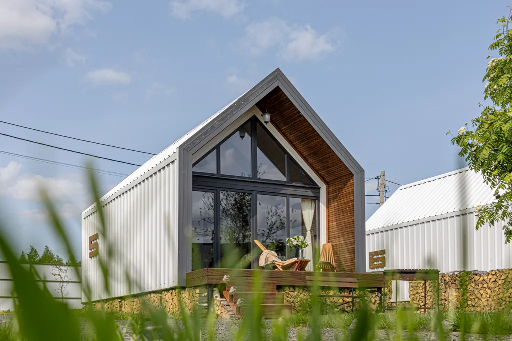 Коттедж Современный загородный дом в стиле барнхаус — Иннолово