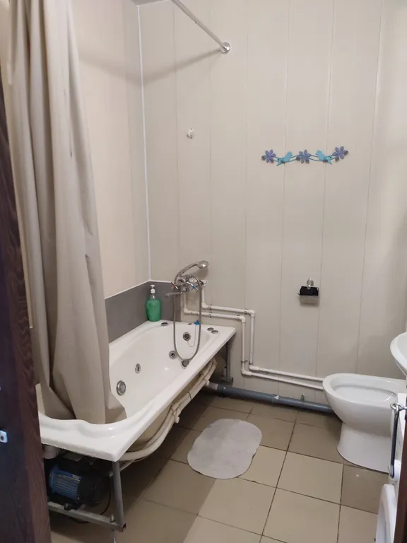 Студия в современном новом доме на проспекте Строителей