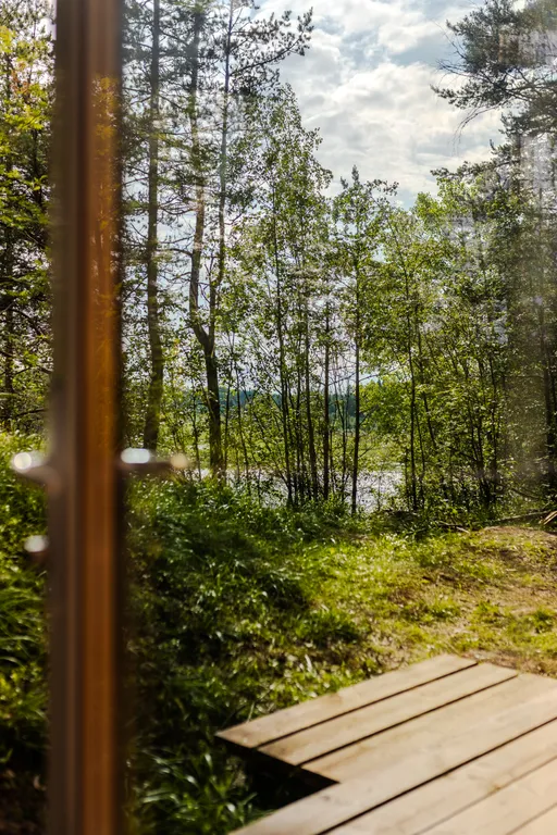 Дом-студия с панорамной стеной на залив Мусталанлахти