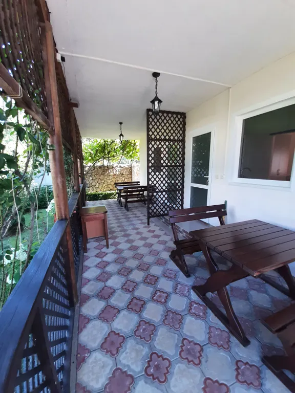 Уютная комната с кухней в частном доме