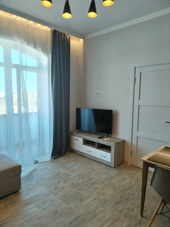 Квартира с видом на бассейн