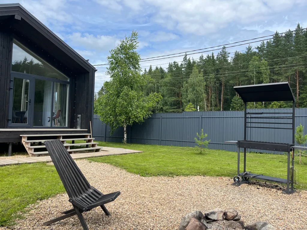 Стильный Барнхаус в окружении леса с сауной и сибирским банным чаном