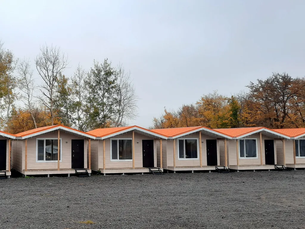 Уютный четырёхместный Домик де-люкс с отдельными кроватями