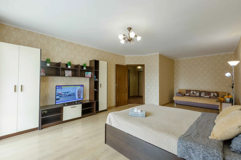 Светлая квартира с панорамными окнами в 10 минутах от парка в центре