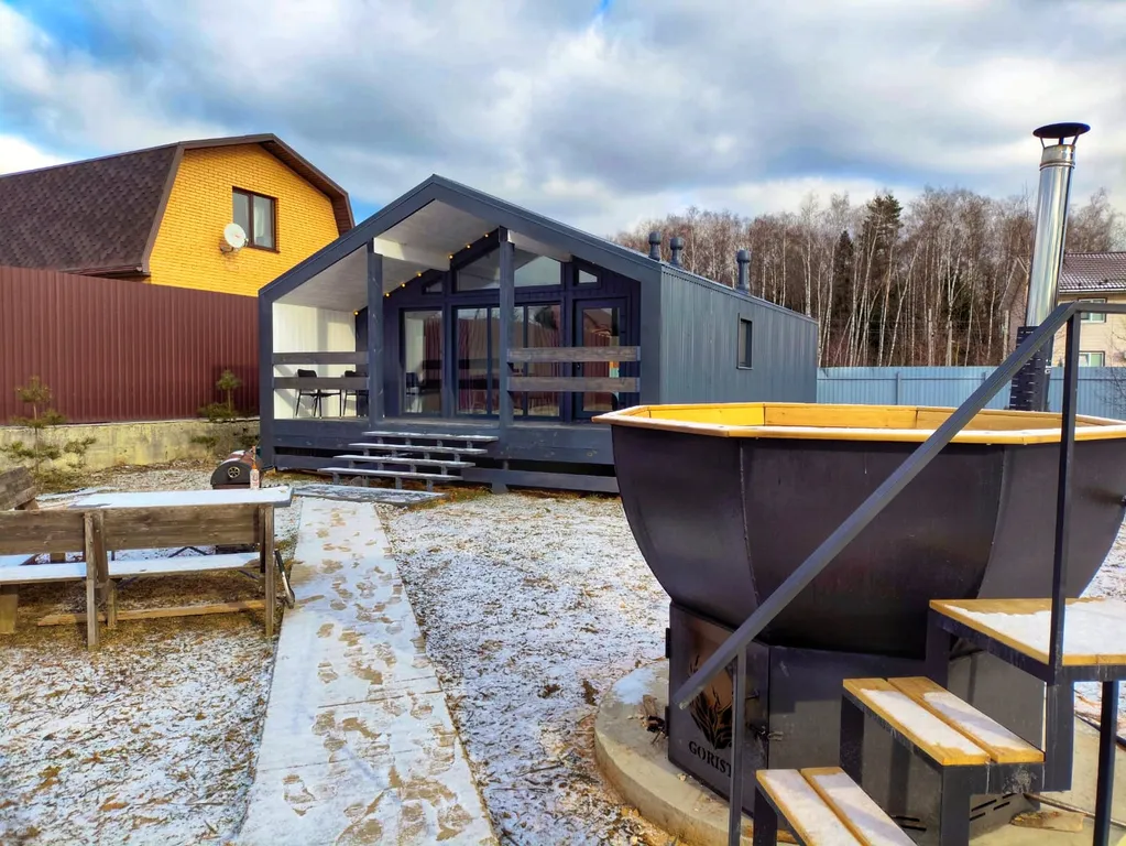 Уютный дом на две семьи в коттеджном поселке