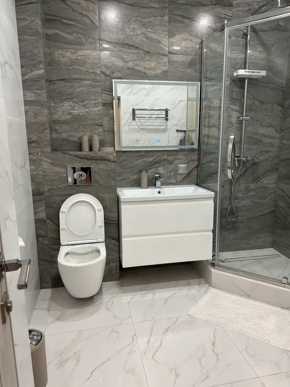 Уютная квартира в центре города с дизайнерским интерьером