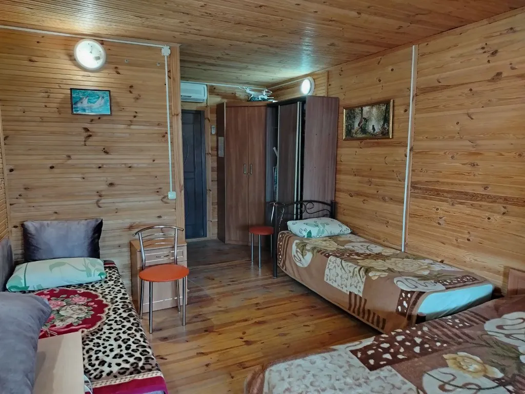 Экологичный деревянный коттедж в можжевеловой роще