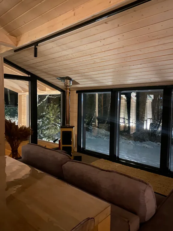 Дача в лесу с панорамными окнами