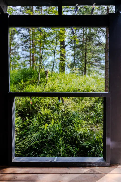 Дом-студия с панорамной стеной на залив Мусталанлахти