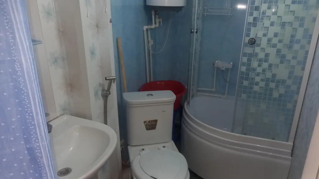 Уютная комната-студия в центре города с цветущим двориком с фонтанчиками