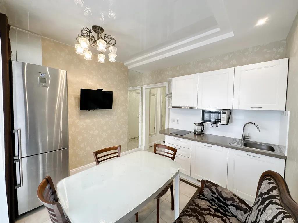 Апартаменты с панорамными окнами на залив