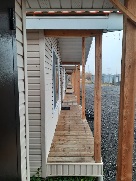 Уютный четырехместный Домик де-люкс с отдельными кроватями