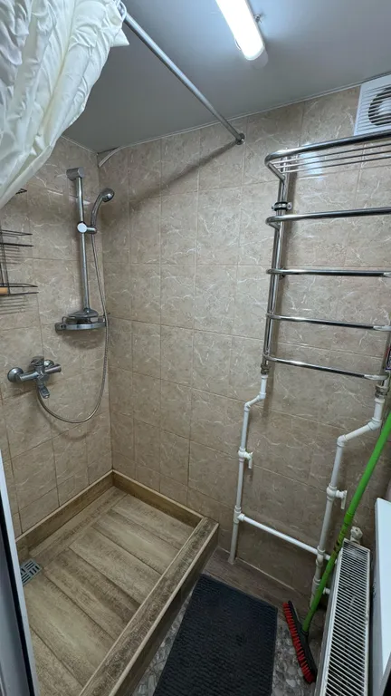 Дом-квартира с мансардой в центре