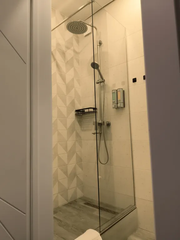 Уютная квартира в самом центре города в современном новом доме