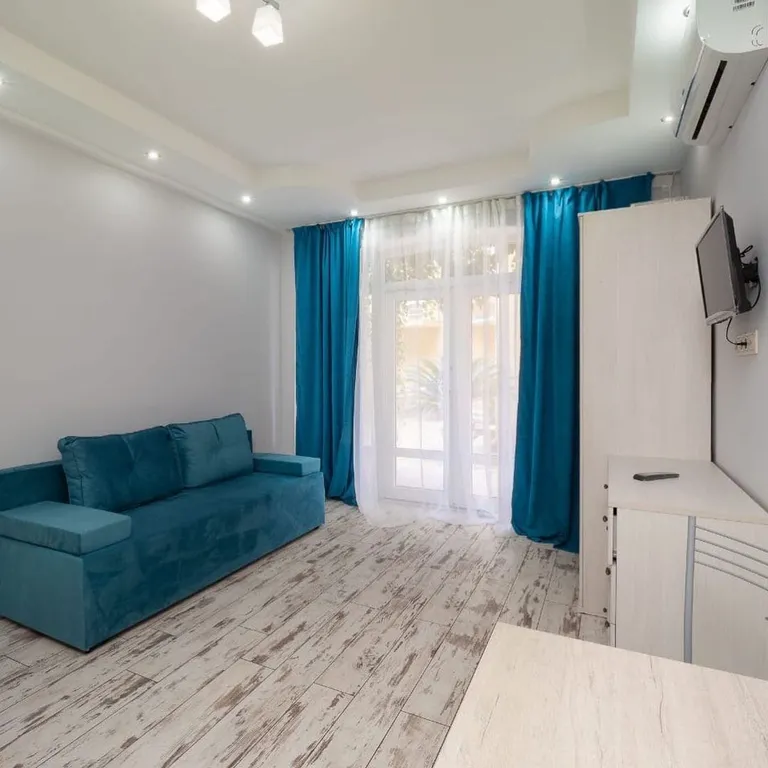 Квартира Квартира Уютная студия у моря с теплым бассейном — Сириус