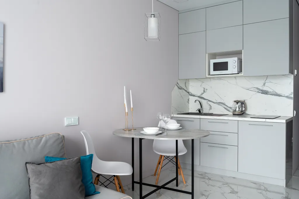 Светлая студия Real Apartments