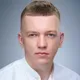Николай