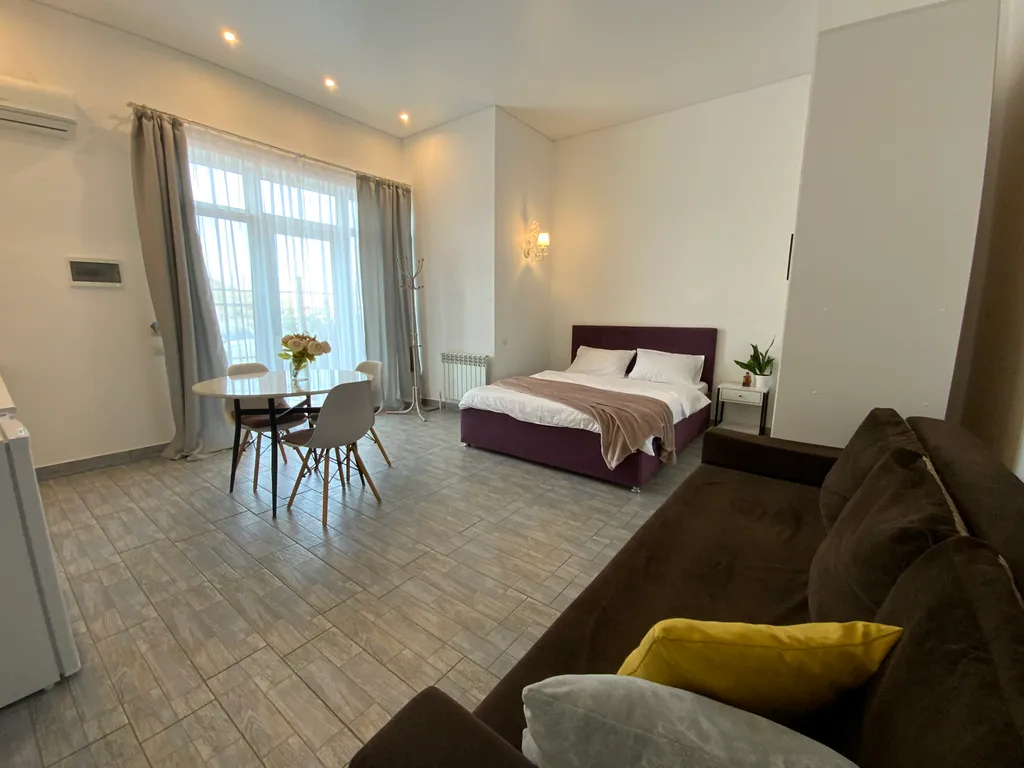 Семейная студия с террасой видом на горы и море