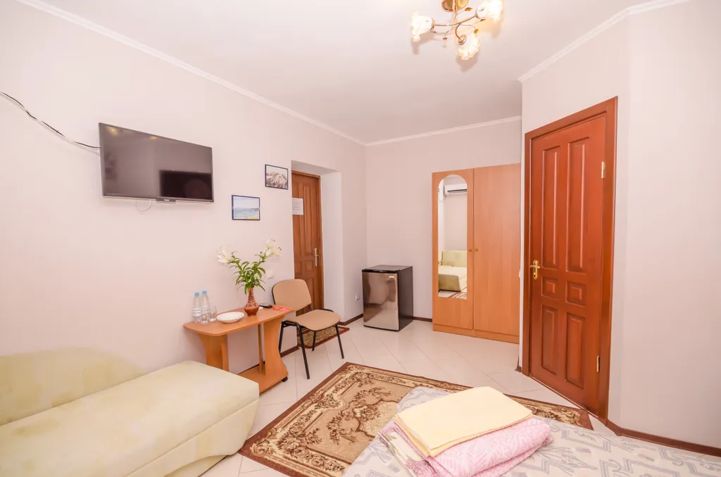 Двухместный Стандарт с двуспальной кроватью и дополнительным местом