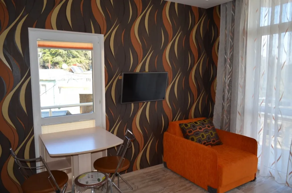 Видовая уютная студия с двумя балконами под горой Кошка