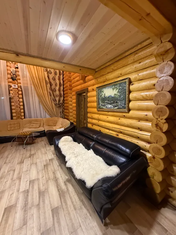 Двухэтажный дом из сруба а Теберде с баней с видом на горы и реку