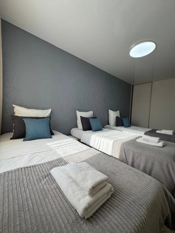 Трехкомнатная квартира с 4 раздельными спальными местами и гостиной