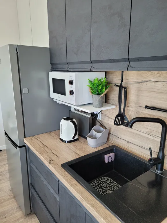 Современная студия у моря с видом на бассейн и горы