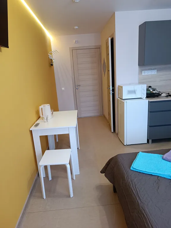 Апартаменты " Как дома" Студия 16 рядом с университетом.