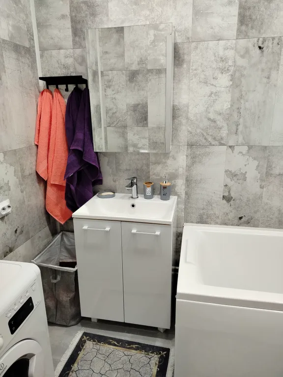 Уютная квартира в новом доме в 10 минутах от центра города