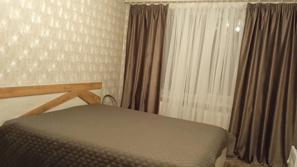 Уютная квартира в 10 минутах пешком от центра