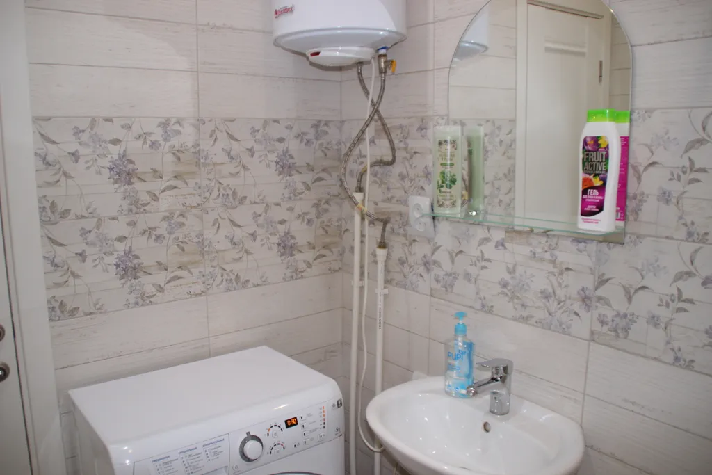 Квартира в Купеческом доме с видом на Красную набережную