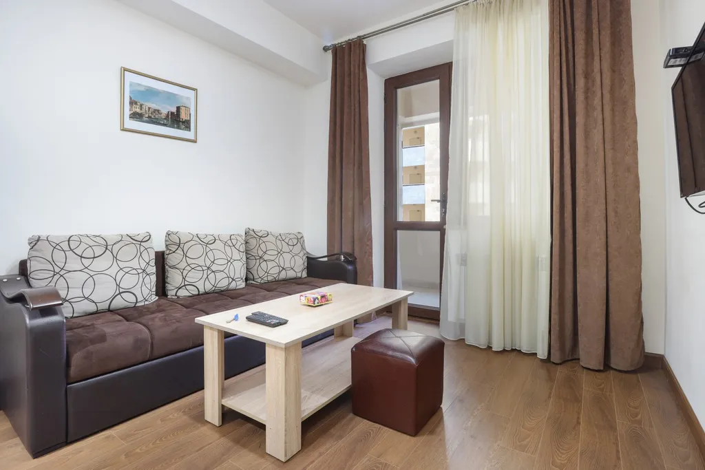 Квартира с 1 спальней и балконом в центре города