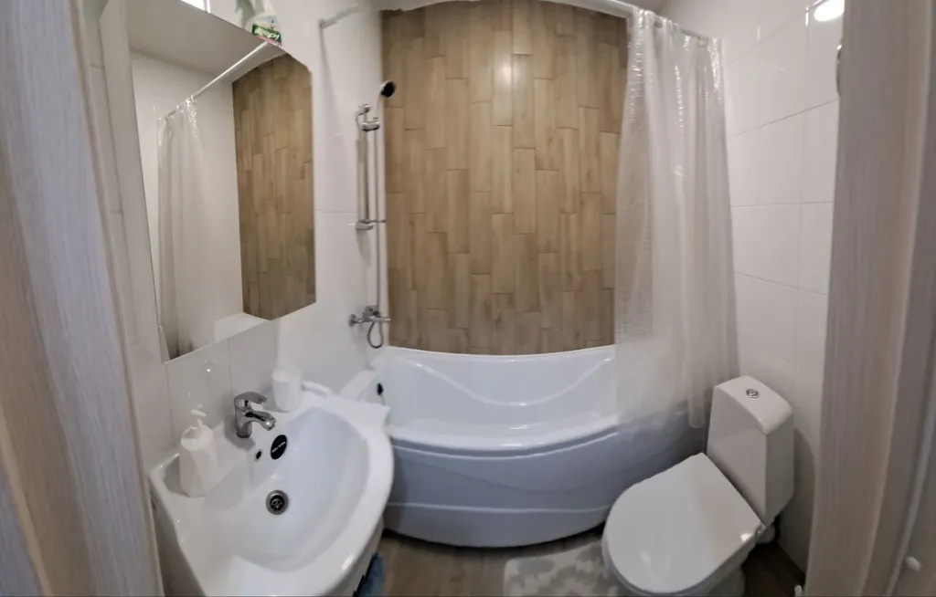 Апартаменты с большой кроватью в Холидей Хаус