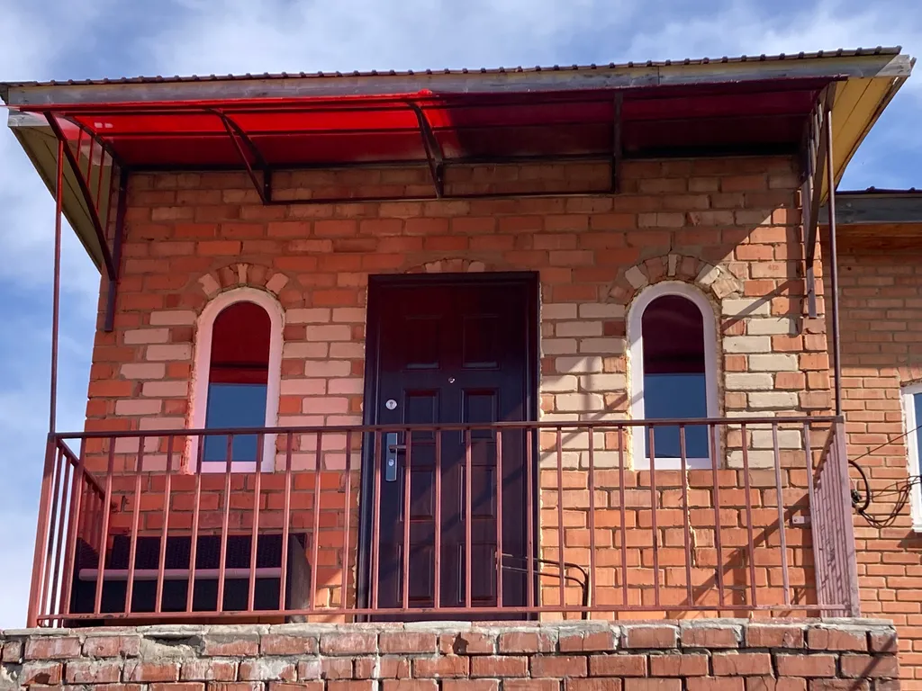 Флигель с балконом