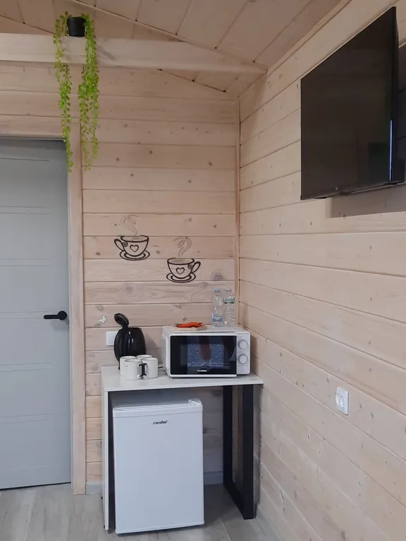 Уютный четырёхместный Домик де-люкс с отдельными кроватями