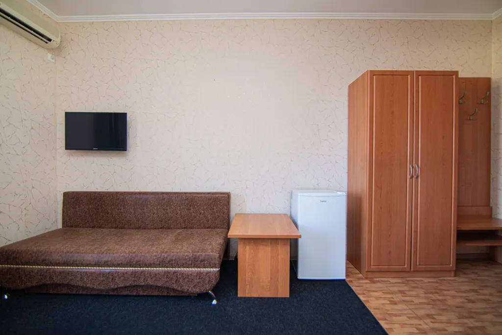 Четырехместный номер с балконом и видом на бассейн