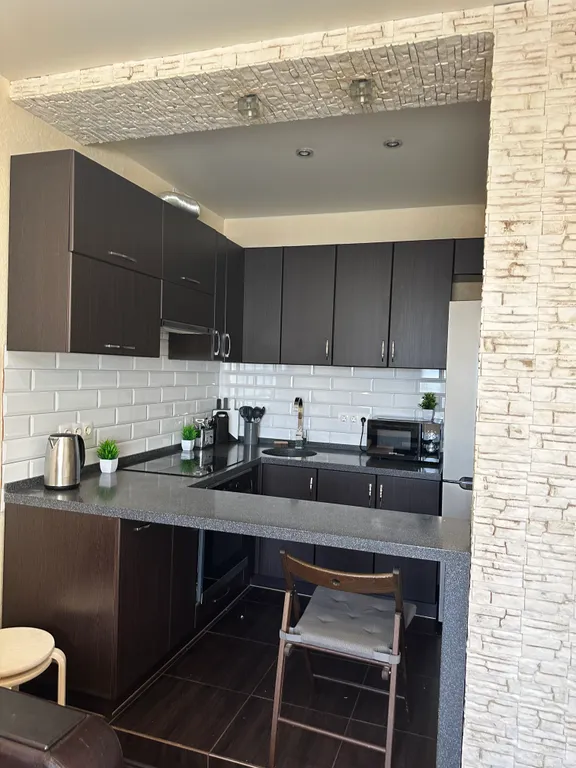 Уютная квартира-студия на 11 этаже