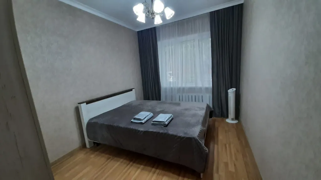 Уютный дом в центре города с местом для парковки автомобиля