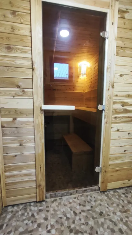 Дом с закрытой парковкой